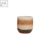 Tierra earthenware planter with a rounded shape and earthy gradient tones in a natural earthenware planter design