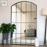 Black wrought iron lattice window mirror with rectangular panes perfect for stylish home decor and full length use