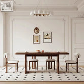 Dark wood toru dining table with curved legs and rectangular top surrounded by matching chairs for dining table setup