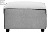 Gray fabric modular ottoman with soft textured fabric and sleek black legs perfect for lounge or living room use