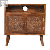 Brown mango wood tova open shelf chest with intricately carved mandala doors and circular cutout top shelf