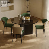 Round black glass tricia dining table with sleek modern design and minimalist legs perfect for stylish dining rooms