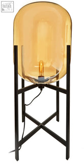 Trieste champagne glass floor lamp with sleek amber glass shade black metal stand and exposed filament bulb