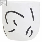 White planter tundra black with minimalist curved black lines in black and white ceramic design