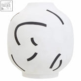 White ceramic vase with curved black lines abstract design called tundra black and white vase