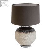 A sleek uli grey table ceramic lamp with a textured gradient base from white to dark gray and a matte brown shade