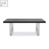 Black ulmus dining table with sleek chrome legs perfect for modern dining spaces
