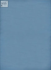 Solid light blue textured fabric surface of an urban outdoor rug perfect for outdoor rug blue settings