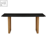 Varana black marble dining table with sleek black marble top and sturdy gold-toned metal legs in a minimalist design