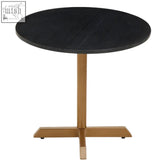 Varana black marble round table with a matte black top and gold-toned cross-shaped base perfect for dining spaces