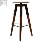 Industrial-style leg bar stool with light wood top black metal frame and dark brown wooden legs perfect for bars
