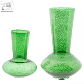 Two green speckled glass vases with rounded bases from the dutz collection mouth blown vase loflo green bubbles