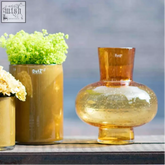 Amber-colored mouth blown glass vase with bulbous body and narrow neck from dutz collection gold bubbles color