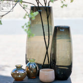 Tall sleek dutz glass vases in gradient amber and dark gray with mouth blown textured finish from dutz collection