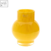 A mouth blown translucent yellow glass vase from the dutz collection with rounded body and narrow neck