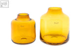 Two amber mouth blown glass vases with modern geometric design from the dutz collection vase tisza amber