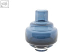 A sleek translucent blue mouth blown glass vase with a rounded body and tiered neck from dutz collection urtii small