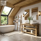 White freestanding bathtub with smooth rounded edges next to venti live edge vanity solid wood with storage