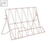 Pink wire vertex cookbook stand with zigzag pattern and adjustable legs for holding cookbooks upright