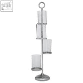 Silver-toned metal verve floor standing 4-light candle holder with four clear glass cylinders in a spiral pattern