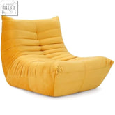 Vesgantti togo fireside chair in mustard yellow soft suede with segmented design perfect for living room lounge