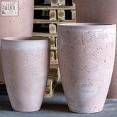 Vessara blushstone tall concrete planter in pigmented concrete with pink textured rustic weathered finish 52cm 15l