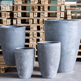Gray speckled concrete tall vase planter by Vessara Onyx Dusk 100cm with tapered cylindrical shape and 172L capacity