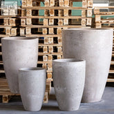 Gray vessara planter xxltall tall concrete planter with speckled tapered cylindrical shape for large plants