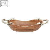 Large oval acacia wood bowl with a wooden serving tray featuring silver-toned twisted handles
