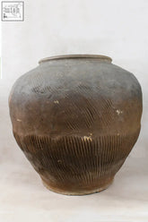Vintage dark brown pot xl nº 2 with a weathered ribbed texture and unglazed exterior from rural china