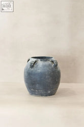 Antique gray ceramic jar with vintage lion ears dark sculpted animal-head handles for decoration or storage