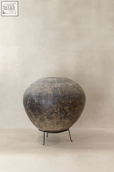 Vintage nupe pot 6.3 is a gray antique ceramic jar with intricate etched patterns and a rustic weathered finish