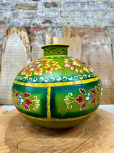Hand-painted green ceramic water pot vase with vibrant floral patterns and gold trim makes a bold statement piece