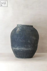 Vintage textured grey ceramic jar with matte black weathered finish and subtle horizontal ridges vintage textured pot