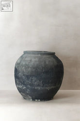 Dark gray ceramic vintage textured grey pot with vertical ribbed texture and weathered chipped surface vt08