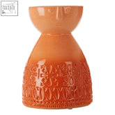 Terracotta coral face vase with stylized face and intricate floral embossing in ceramic Visage medium coral face vase