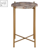 Gold-finished metal vita natural agate side table with a round light-colored marble top featuring natural veining