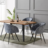 Gray quilted velvet dining chair with black metal legs and gold cross braces perfect for dining room living room velvet dining