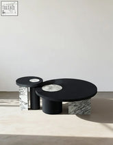 Vivien coffee table set with black marble top wood coffee tables featuring sleek cylindrical bases and white veined stone accents
