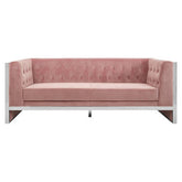 Vogue 3 seat pink velvet sofa with a sleek tufted back and polished chrome legs in soft pink velvet upholstery