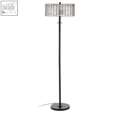 Black metal waldorf deco floor lamp with cylindrical shade featuring an intricate grid pattern for stylish lighting