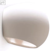 A sleek off-white ceramic wall lamp with smooth curved design and soft diffused light bulb glow ideal for classic decor