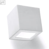White ceramic wall lamp leo with a recessed square light bulb panel in a simple classic cube design