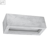 Concrete rectangular wall lamp with speckled gray finish and recessed channel for modern light bulb use