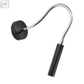 Black flexible gooseneck wall lamp with metallic segmented steel arm and matte black head for g9 light bulb