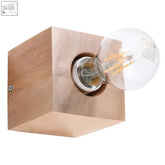 Minimalist wooden cube wall lamp ariz with a clear glass light bulb for scandinavian design spaces