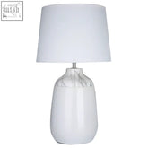 Wenita white ceramic table lamp with a marble patterned base and plain white fabric shade for stylish lighting