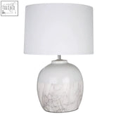 White ceramic table lamp with subtle crackle glaze and white fabric shade called whitley table lamp