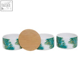 Set of three stackable canisters with white ceramic and winter palm teal fern pattern with natural wood lids