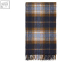 Winterton merino lambswool throw in navy plaid with soft woolen texture and fringed edges for cozy warmth